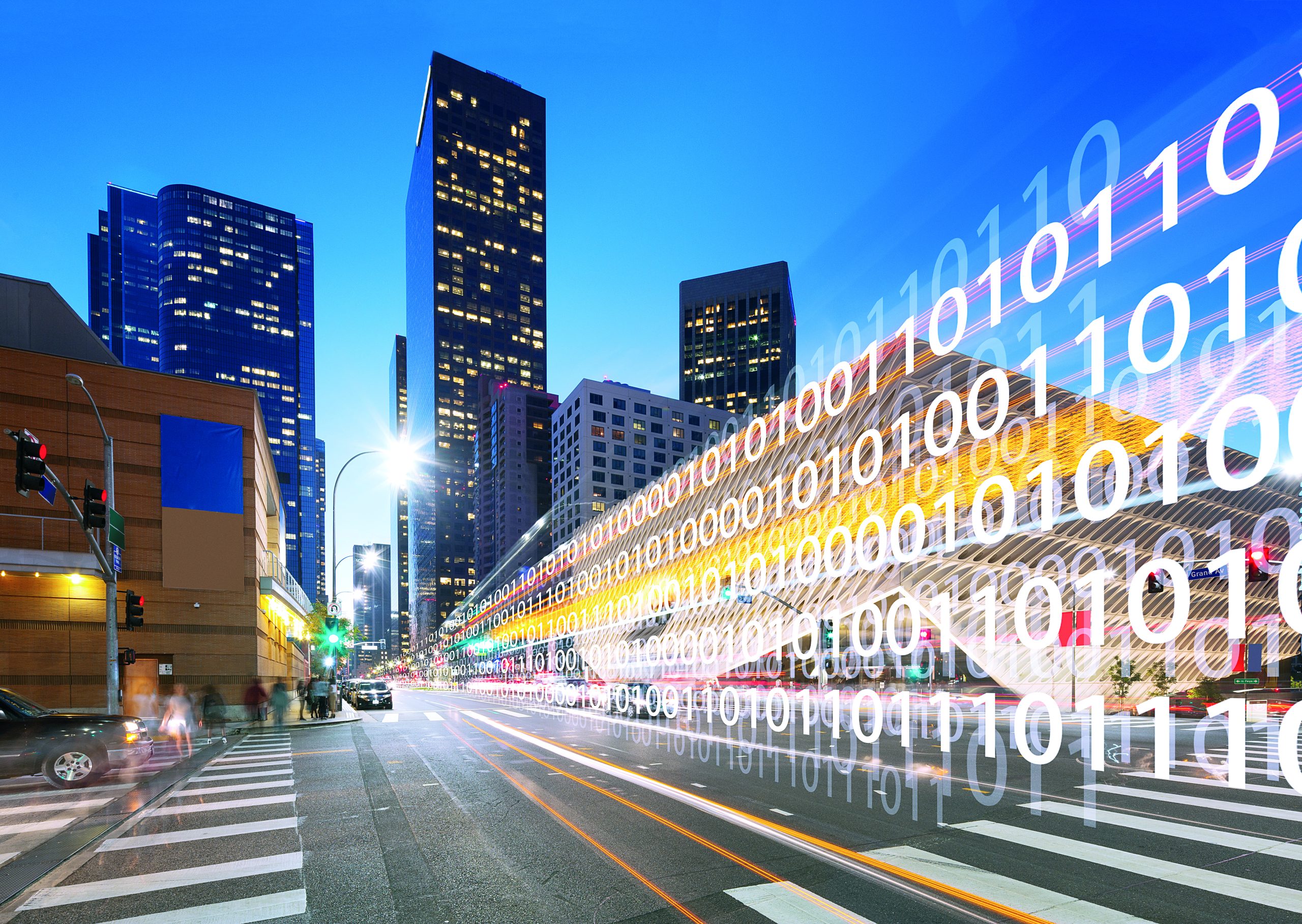 Smart traffic on road in downtown of los angeles at night